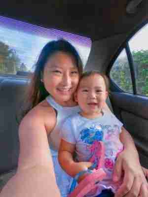 Mommy and Daughter in a car Hiring A Local Chauffeur 