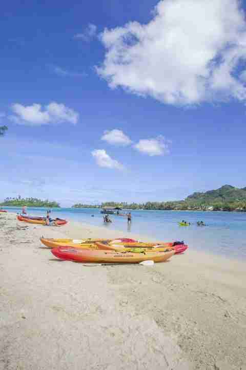 Kayaks on the beautiful waters of Moto Koromiri, no touching island in Muri, Rarotonga