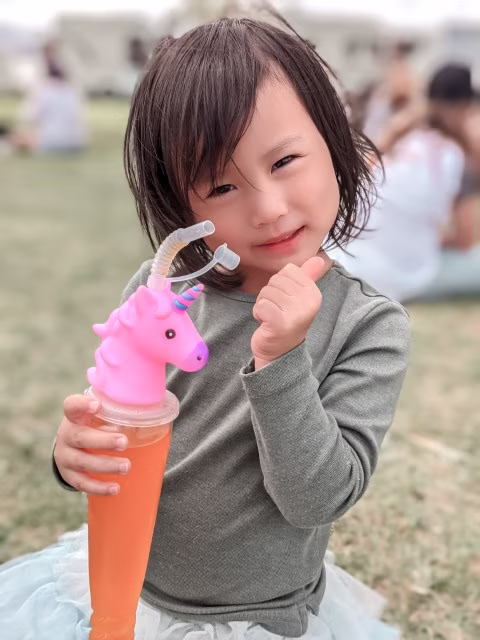 Kid Drinking Fancy Unicorn Fanta at The Kumeu Show Auckland