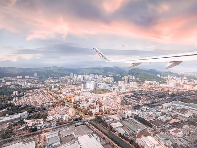 Our Penang to KL Flight beautiful Malaysian city view underneath