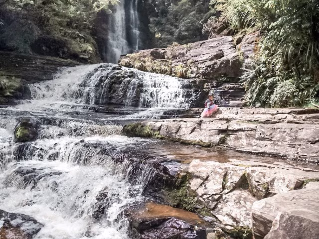 da.co-Blog-Millennial-Travel-Beyond-Instagram-Authentic-Connections-Waterfall-New-Zealand-Family-Ki