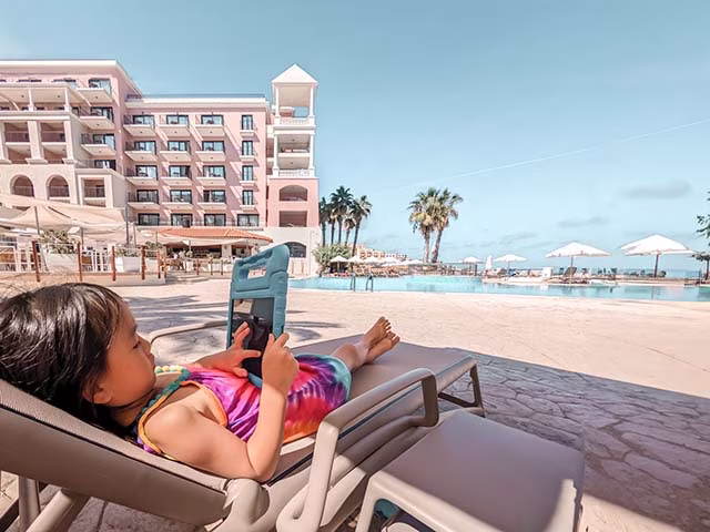 Pack Light Travel Light Minimalist Malta Westin Dragonara Resort Pool Family Blog Kida