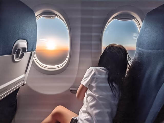 Sunset View Window Plane Family Minimalists Travel Blog Kida