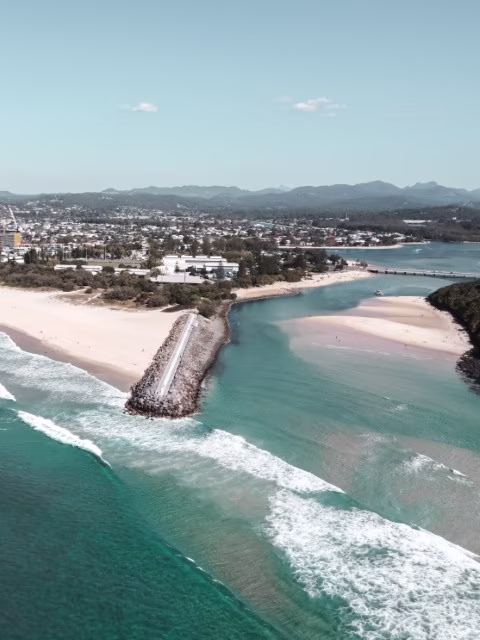 A scenic view of Burleigh Heads on the Gold Coast, showcasing a popular spot on the Sydney to Brisbane road trip along the east coast of Australia.