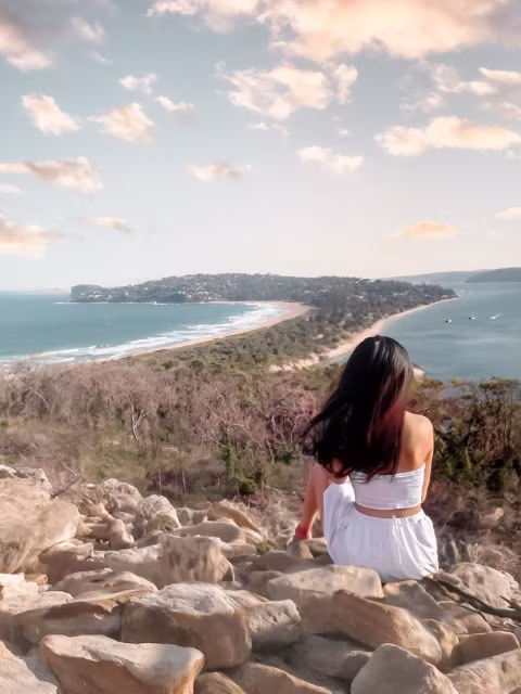 A view of Palm Beach and Barrenjoey, highlights of the Sydney to Brisbane road trip on the east coast of Australia.