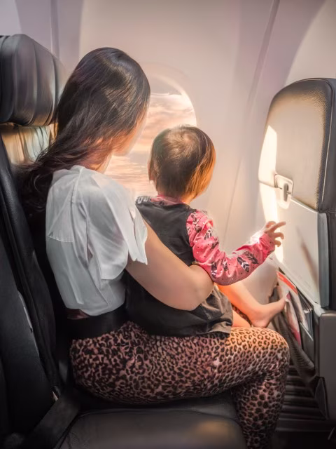 Flying with an Infant in Lap Plane Travelling with Baby Tips Blog Kida