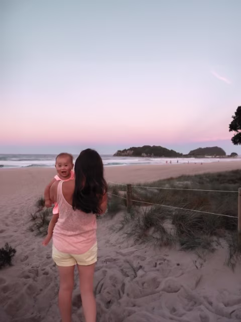 Family at Mt Maunganui Beach During Sunset