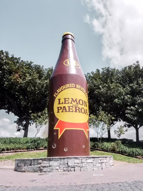 Things To Do in Coromandel Must-Do Attractions Giant L P Bottle New Zealand Travel Blog Kida
