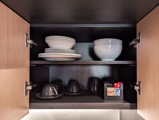 Plates Bowls Coffee Tea Kitchenette Tradewinds Hotel and Suite Fremantle