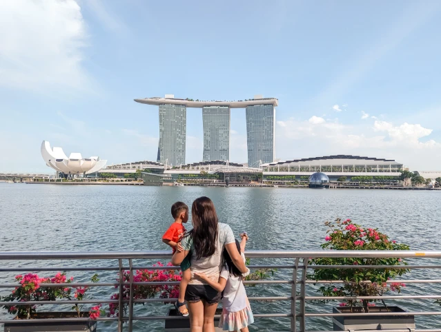 family looking out to Marina Sands Resorts Singapore landmark travel destinations family blog