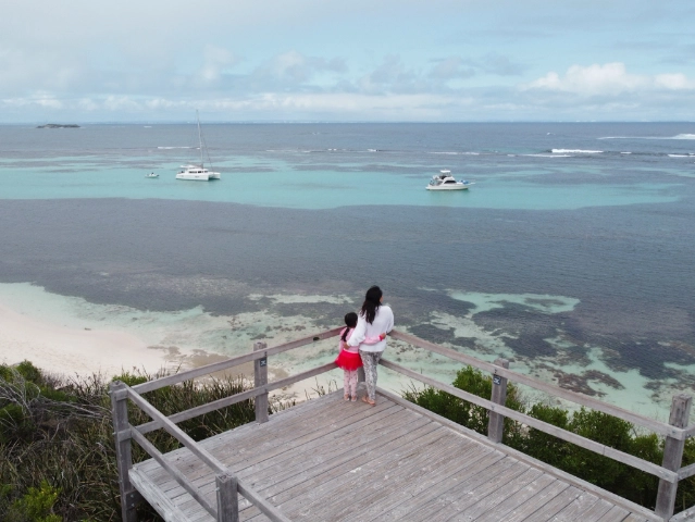 family in Rottnest Island Perth Australia beautiful turquoise water aerial drone view