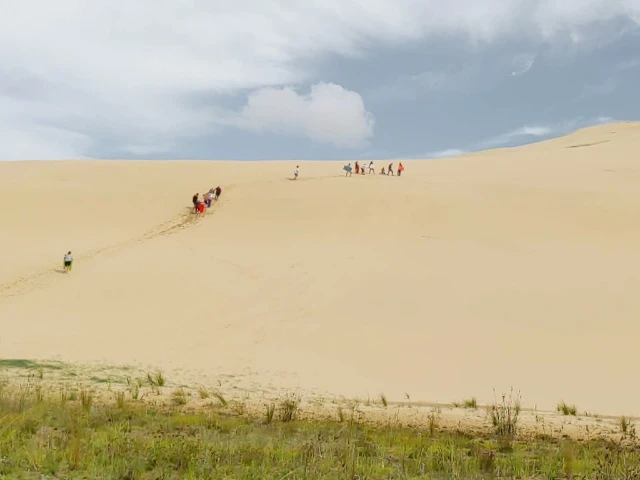 sandboarding dunes Cape Reinga Northland New Zealand travel guide cover